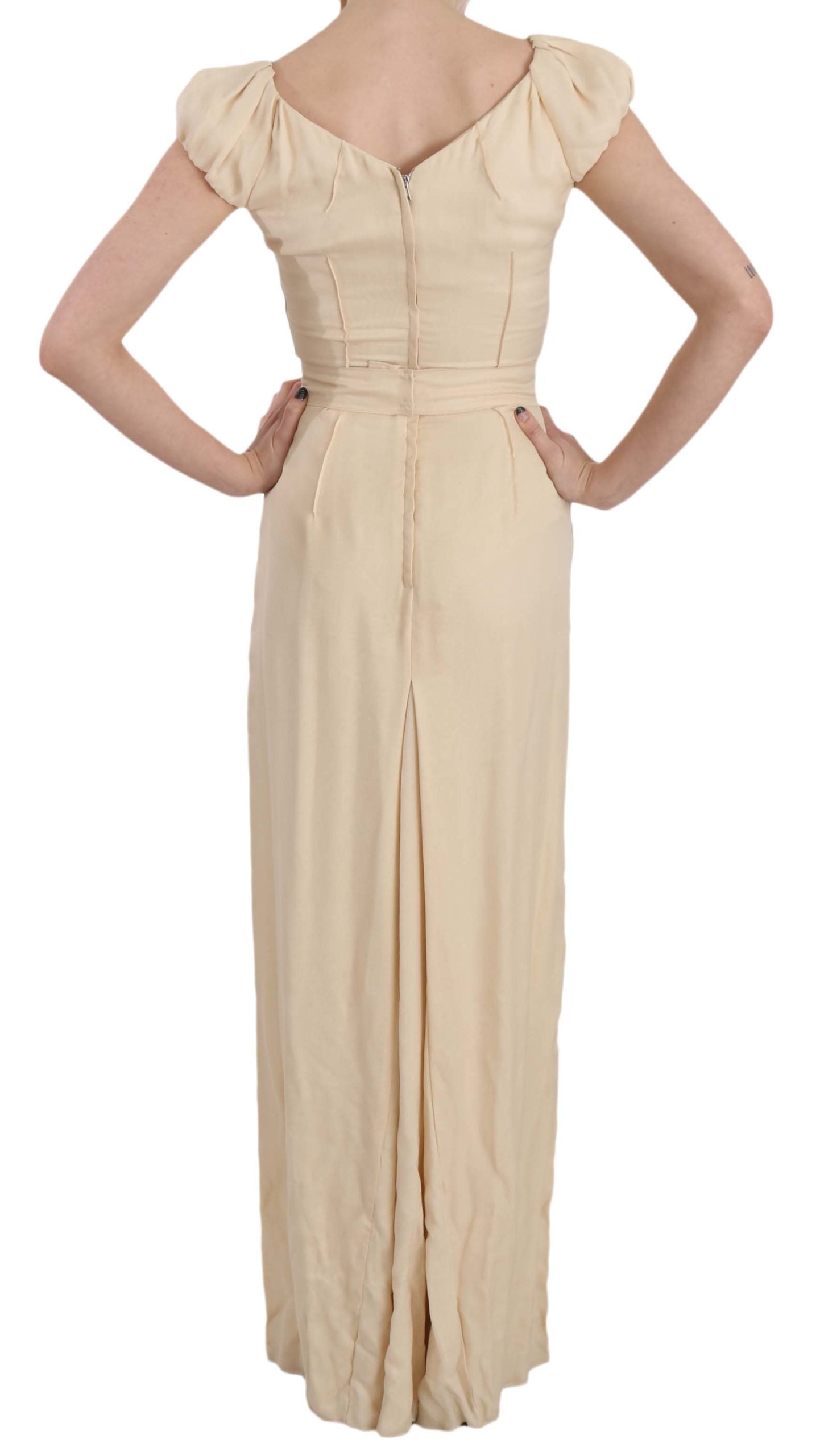Vestido de seda con mangas con liga y columna