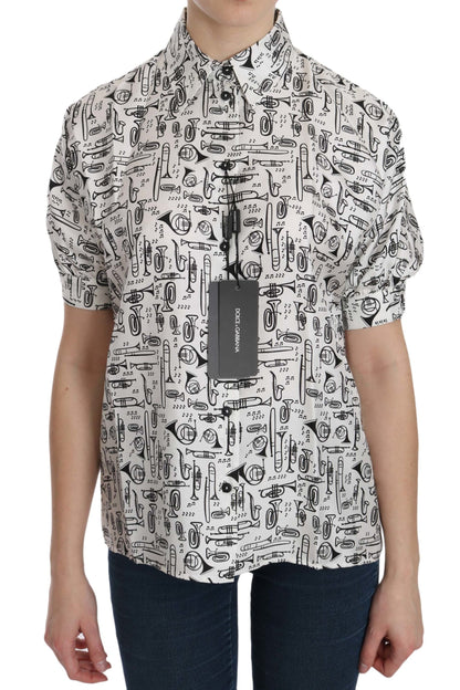 Top de seda con cuello y estampado de instrumentos musicales