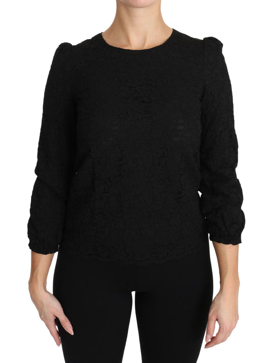 Elegante blusa negra con cuello redondo y estampado floral