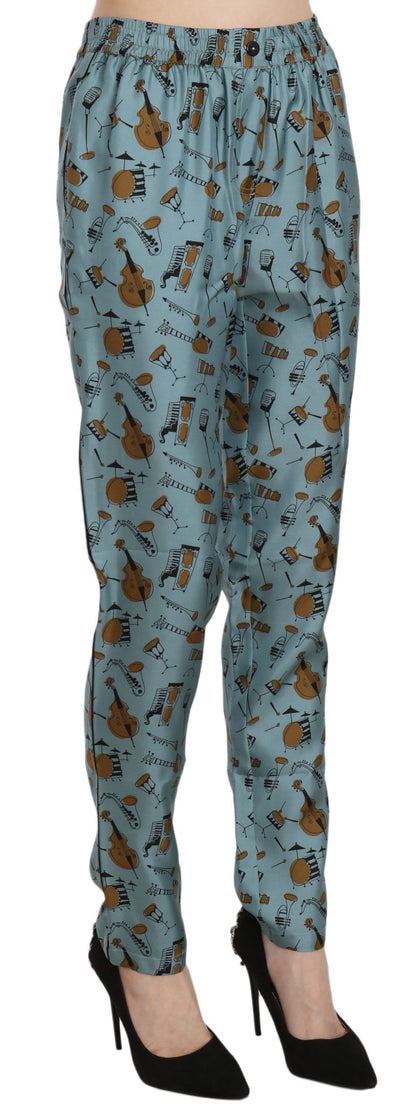 Pantalones de seda cónicos de cintura alta con estampado azul