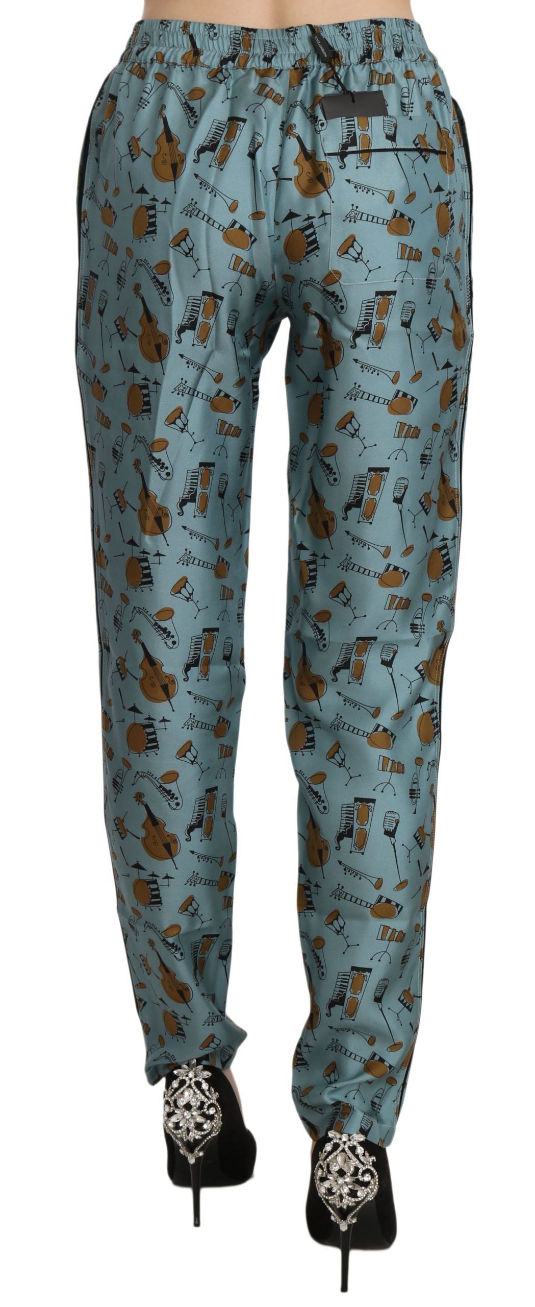 Pantalones de seda cónicos de cintura alta con estampado azul