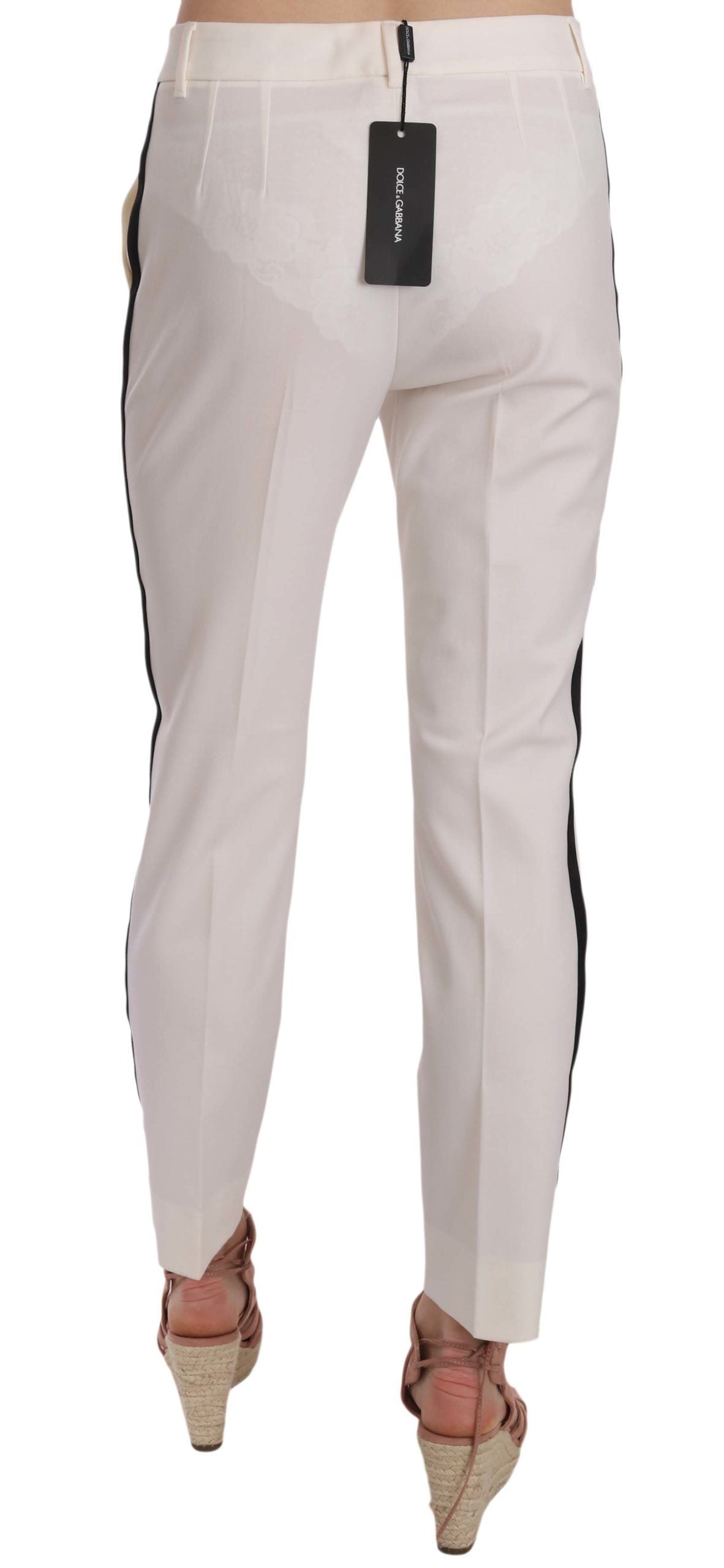 Elegantes pantalones cónicos de lana con rayas blancas