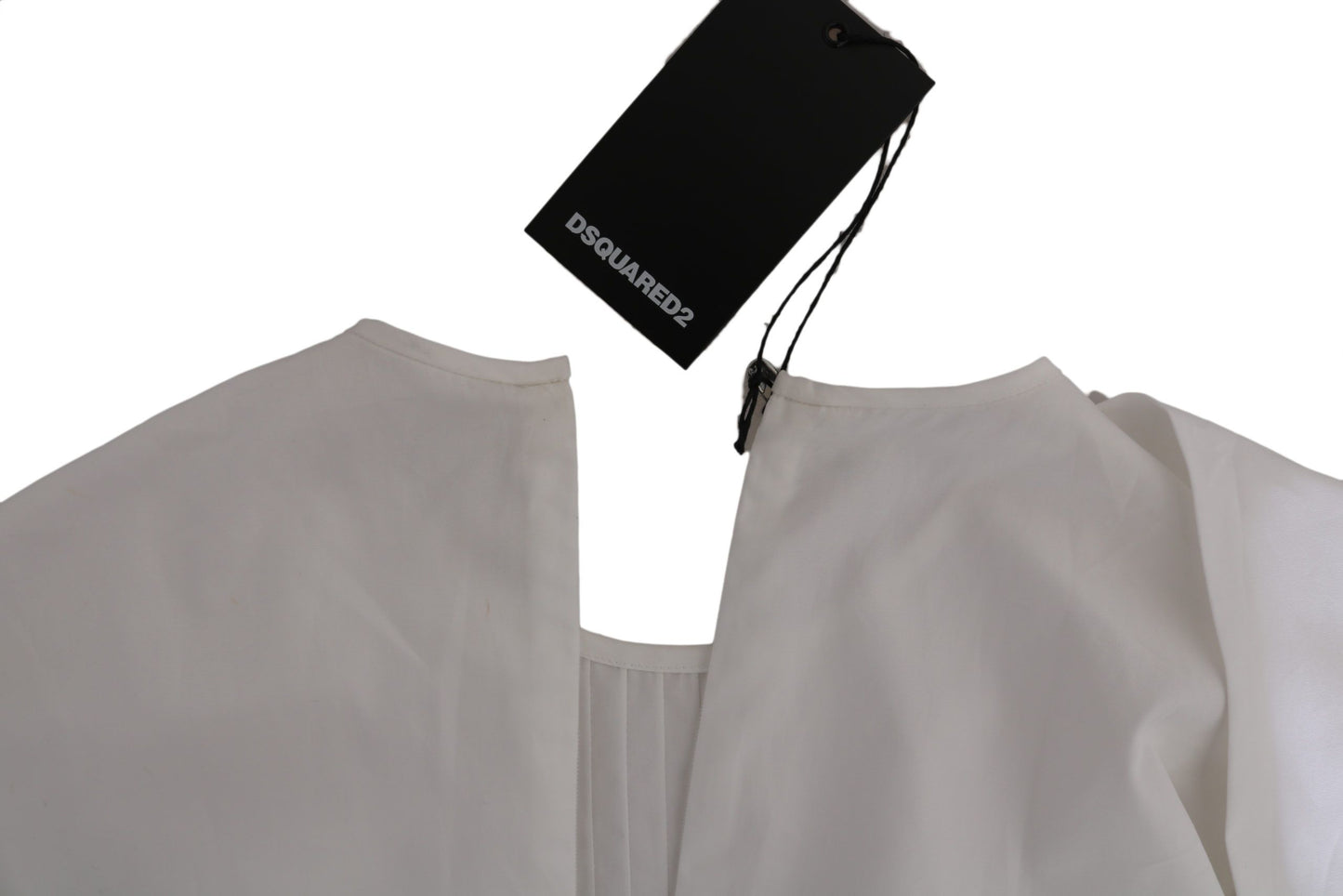 Elegante top de algodón blanco con cuello redondo