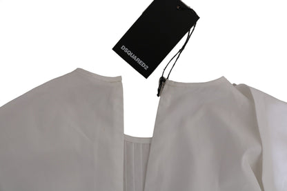 Elegante top de algodón blanco con cuello redondo