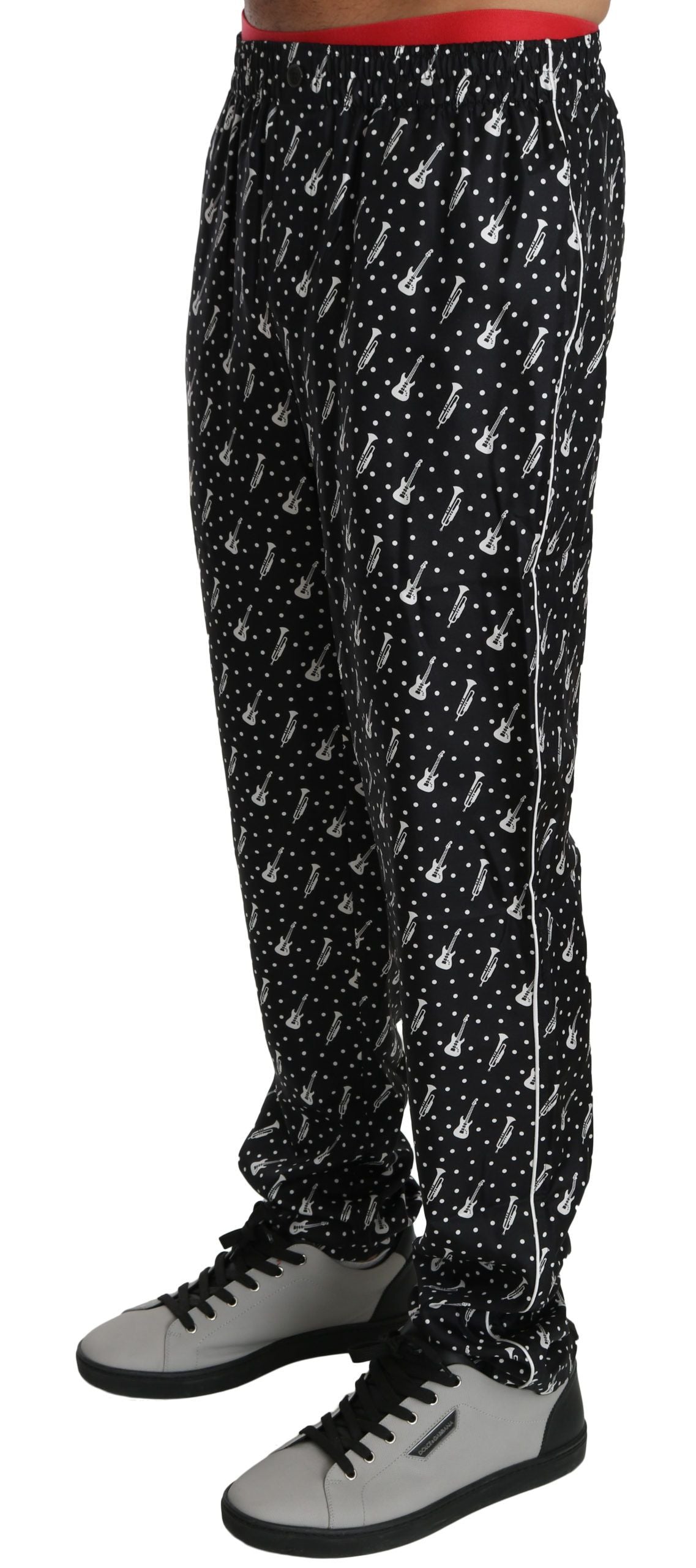 Pantalones elegantes de seda con estampado de instrumentos musicales negros