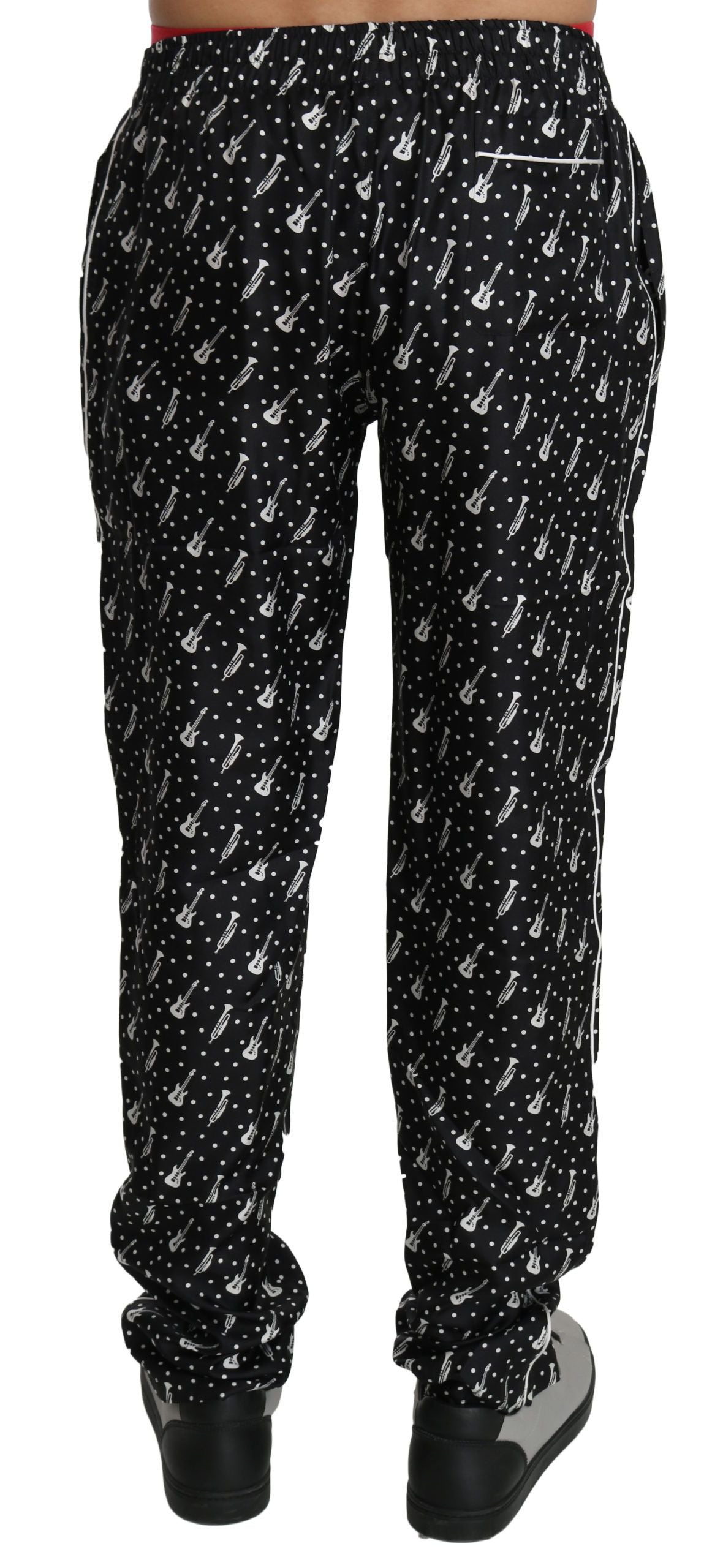 Pantalones elegantes de seda con estampado de instrumentos musicales negros