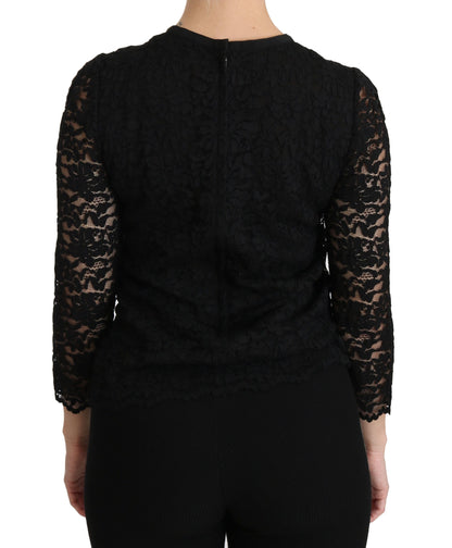 Elegante blusa de encaje negro con cuello redondo