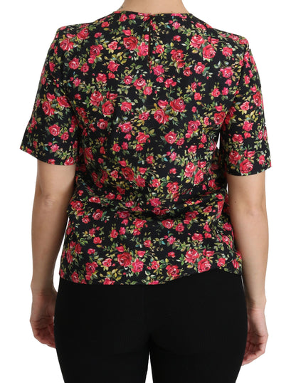 Elegante top negro con cuello redondo y estampado floral