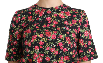 Elegante top negro con cuello redondo y estampado floral