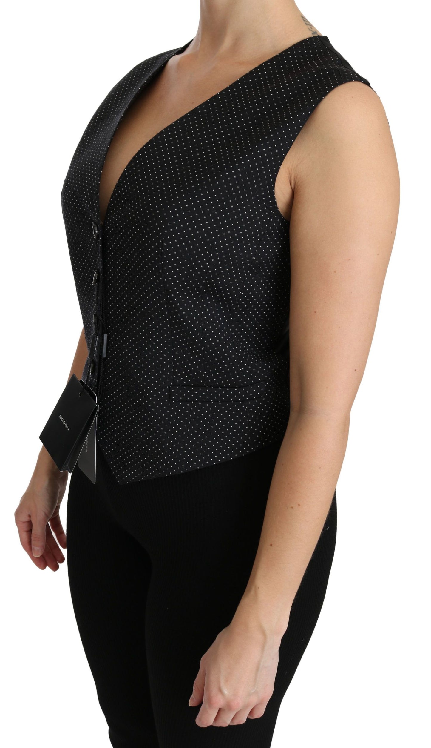 Chaleco elegante sin mangas de mezcla de lana con lunares negros