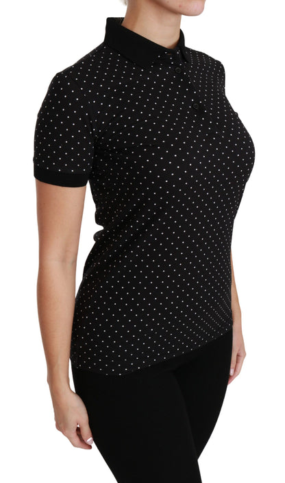 Elegante polo negro de lunares