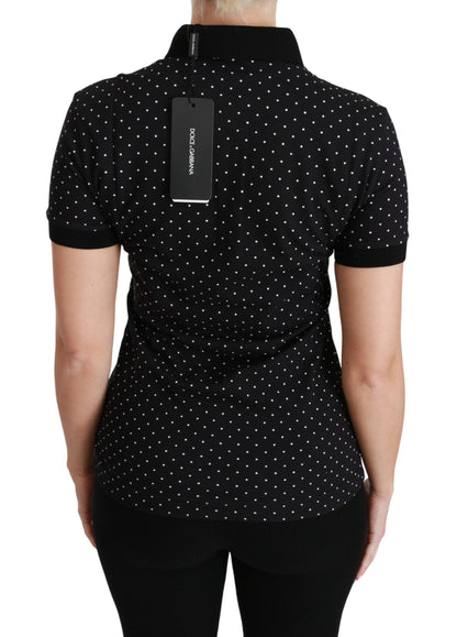 Elegante polo negro de lunares