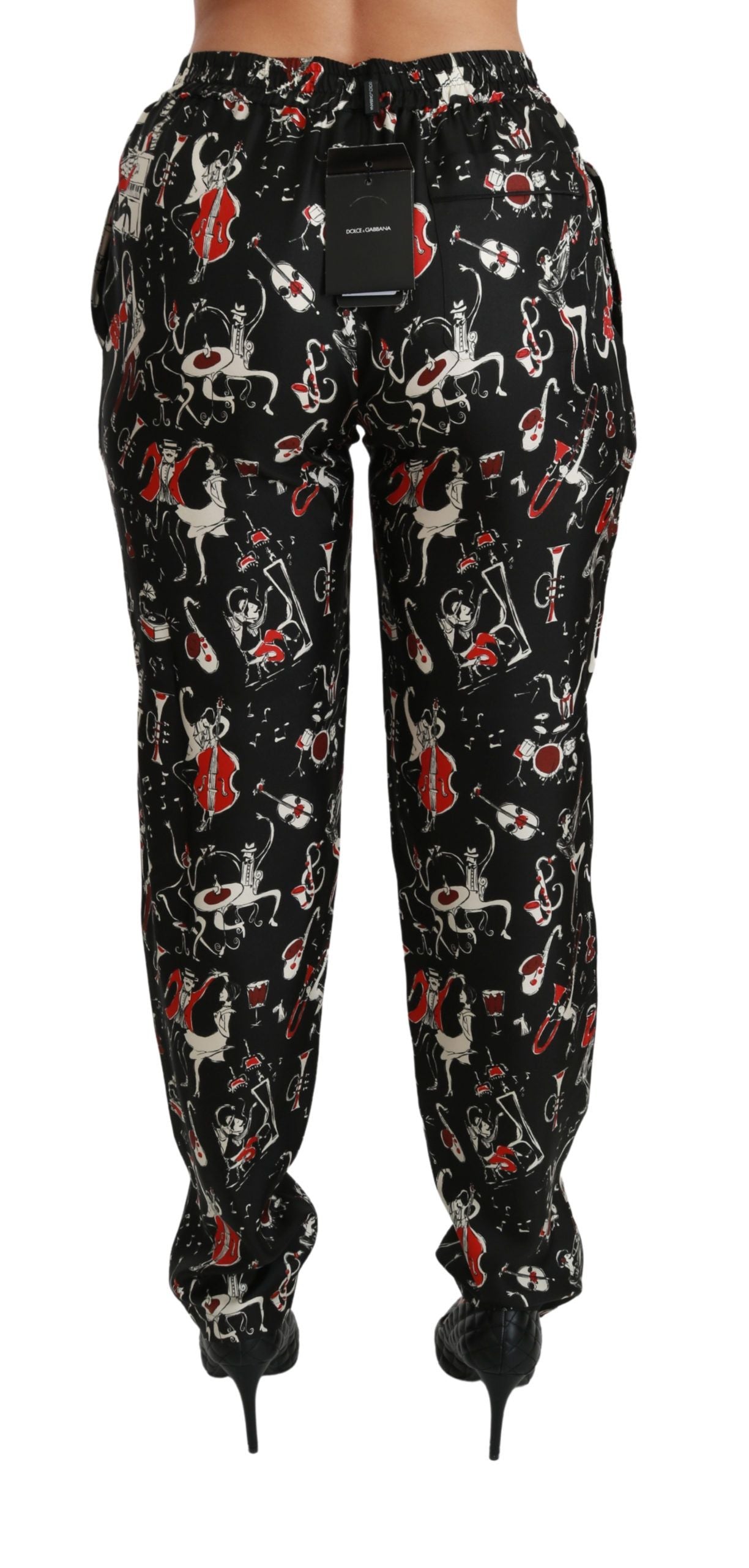 Pantalones de seda elegantes de talle medio y corte entallado