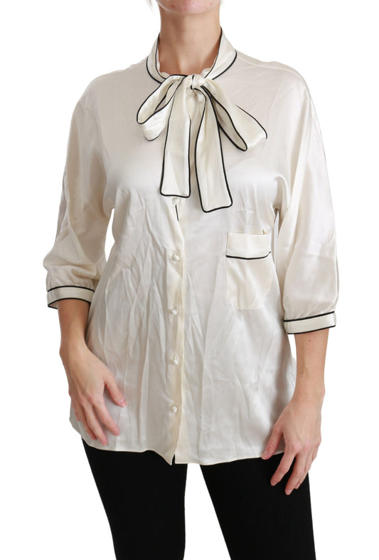 Elegante blusa de seda beige con pañuelo de lazo