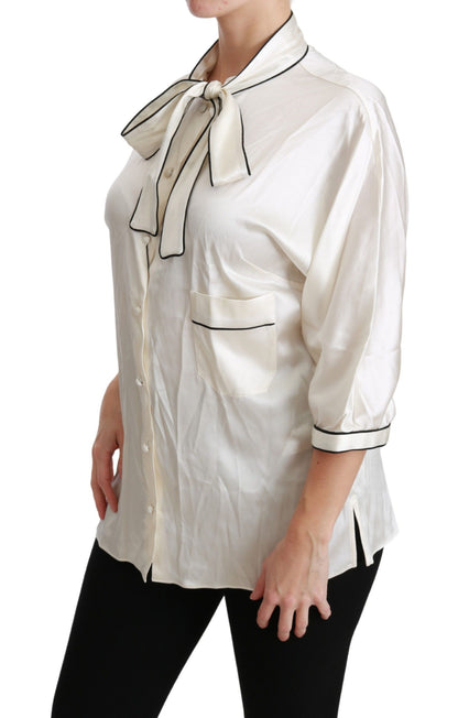 Elegante blusa de seda beige con pañuelo de lazo