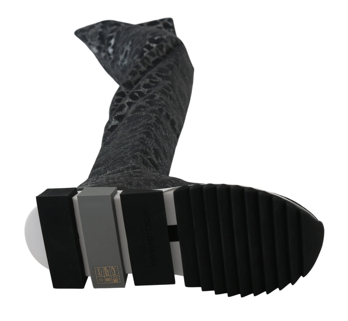 Botines elegantes de leopardo por encima de la rodilla