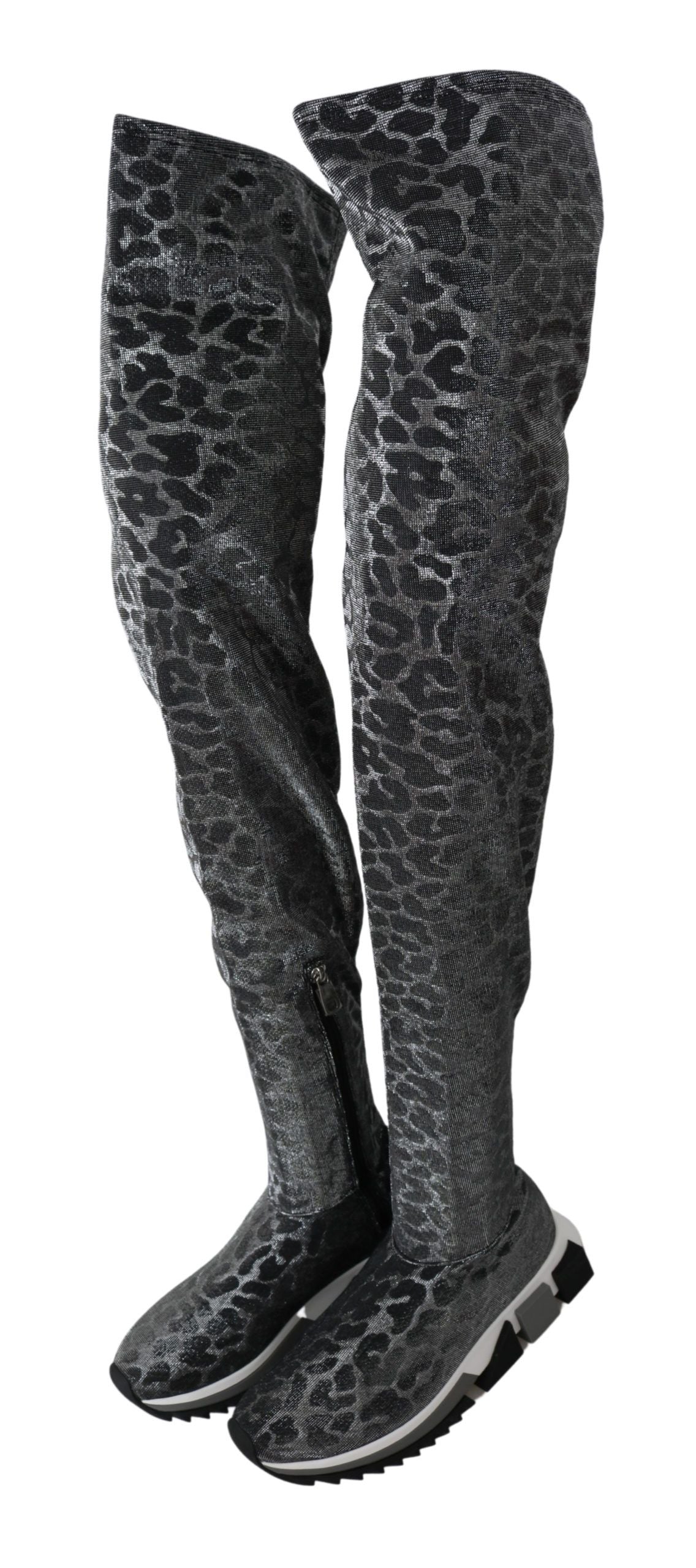 Botines elegantes de leopardo por encima de la rodilla