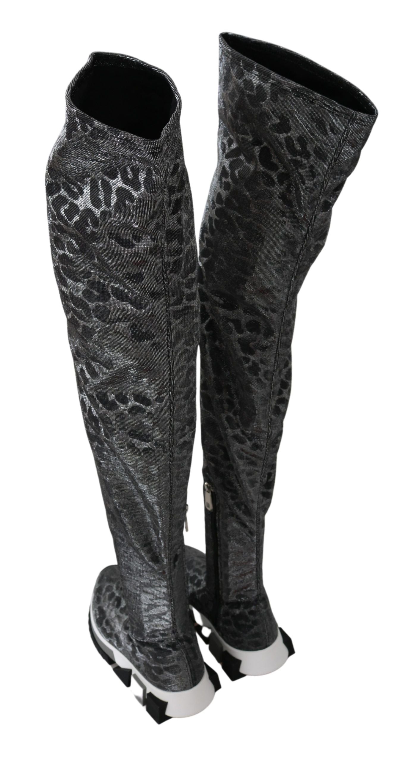Botines elegantes de leopardo por encima de la rodilla