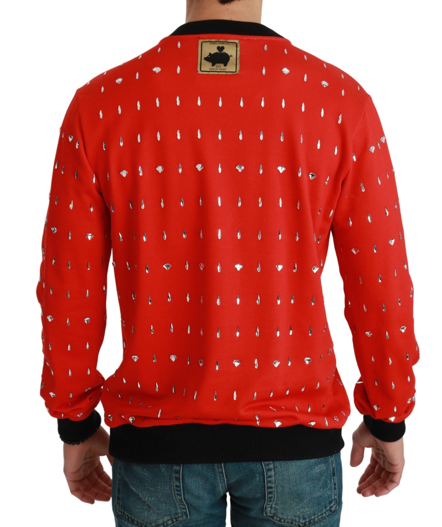 Suéter elegante con cristales rojos