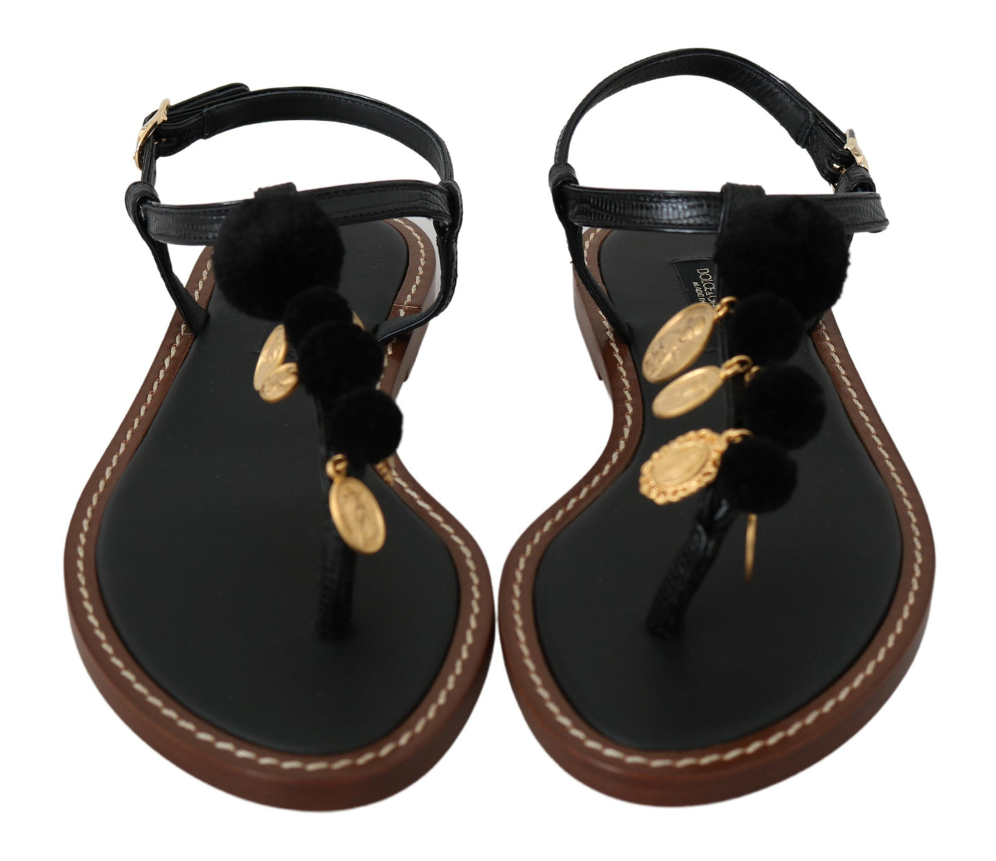 Chanclas planas con tiras en el tobillo y pompones