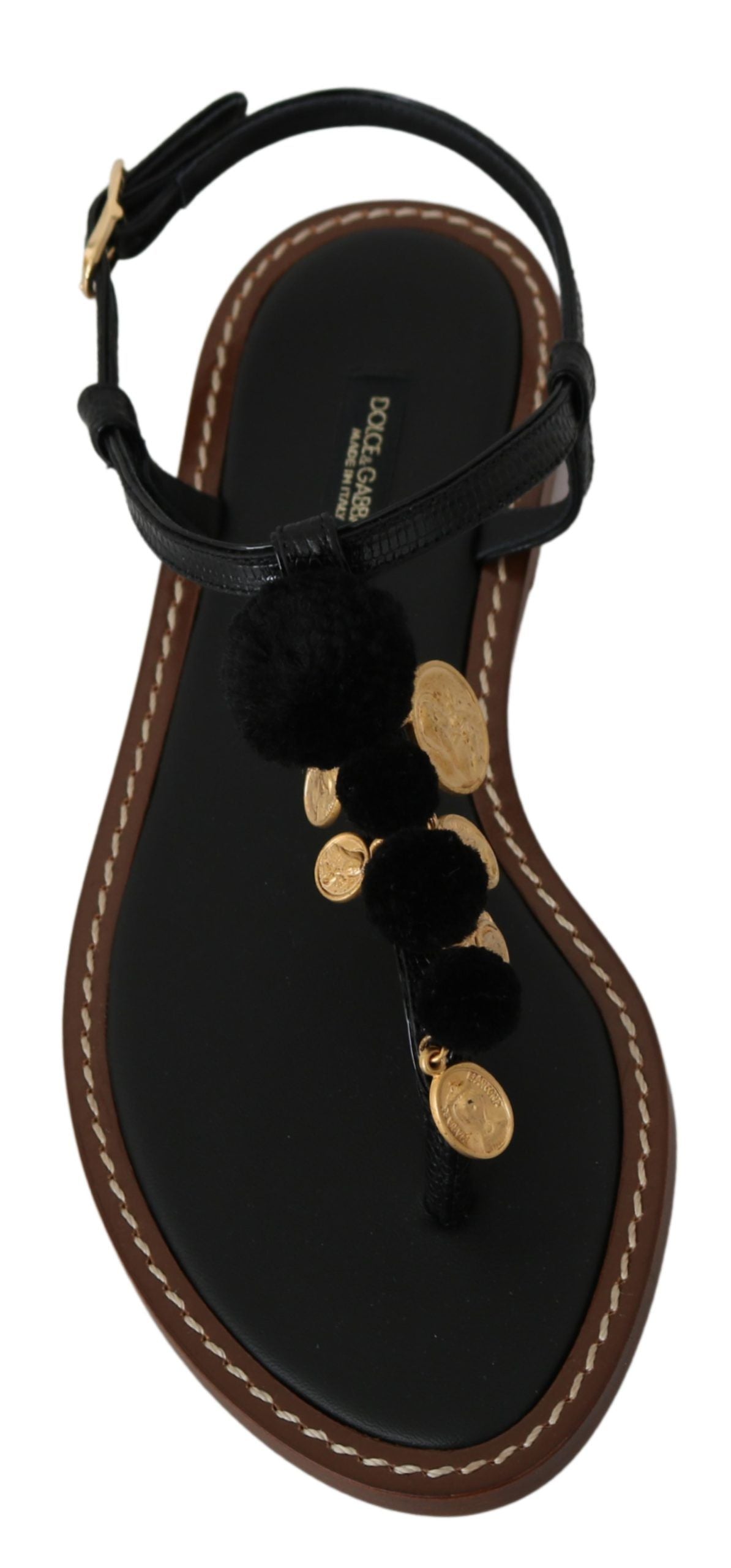 Chanclas planas con tiras en el tobillo y pompones