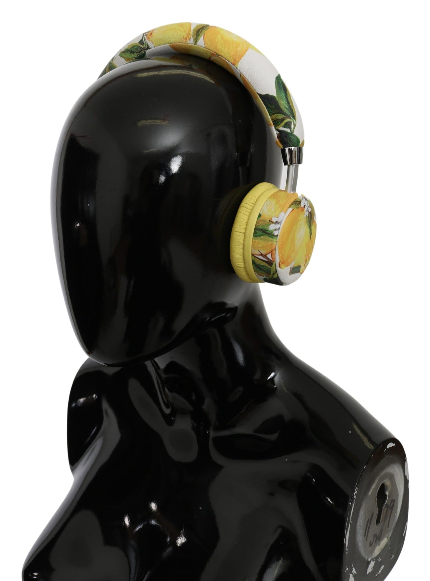 Auriculares elegantes de cuero blanco con estampado amarillo