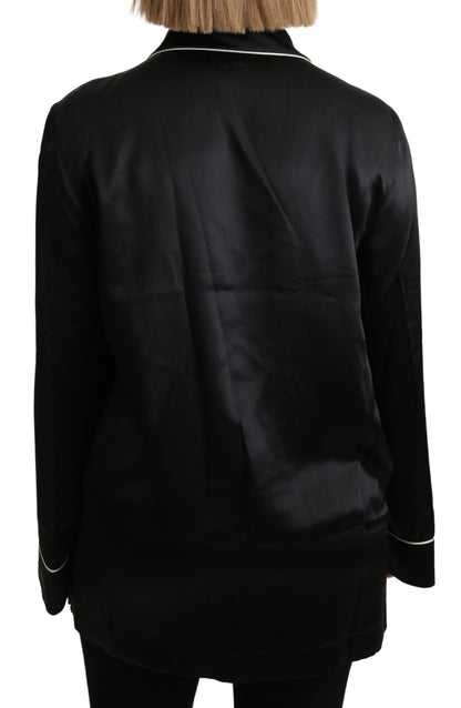 Elegante blusa de seda negra con botones