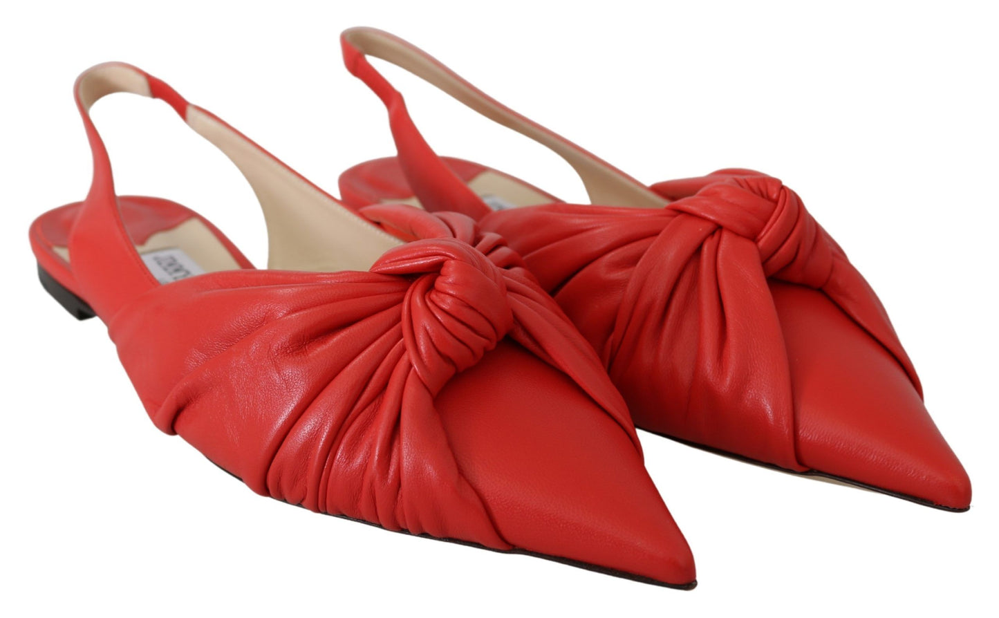 Elegantes zapatos planos de cuero con punta roja