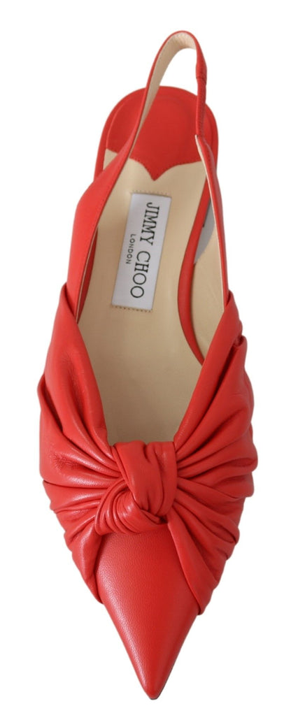 Elegantes zapatos planos de cuero con punta roja