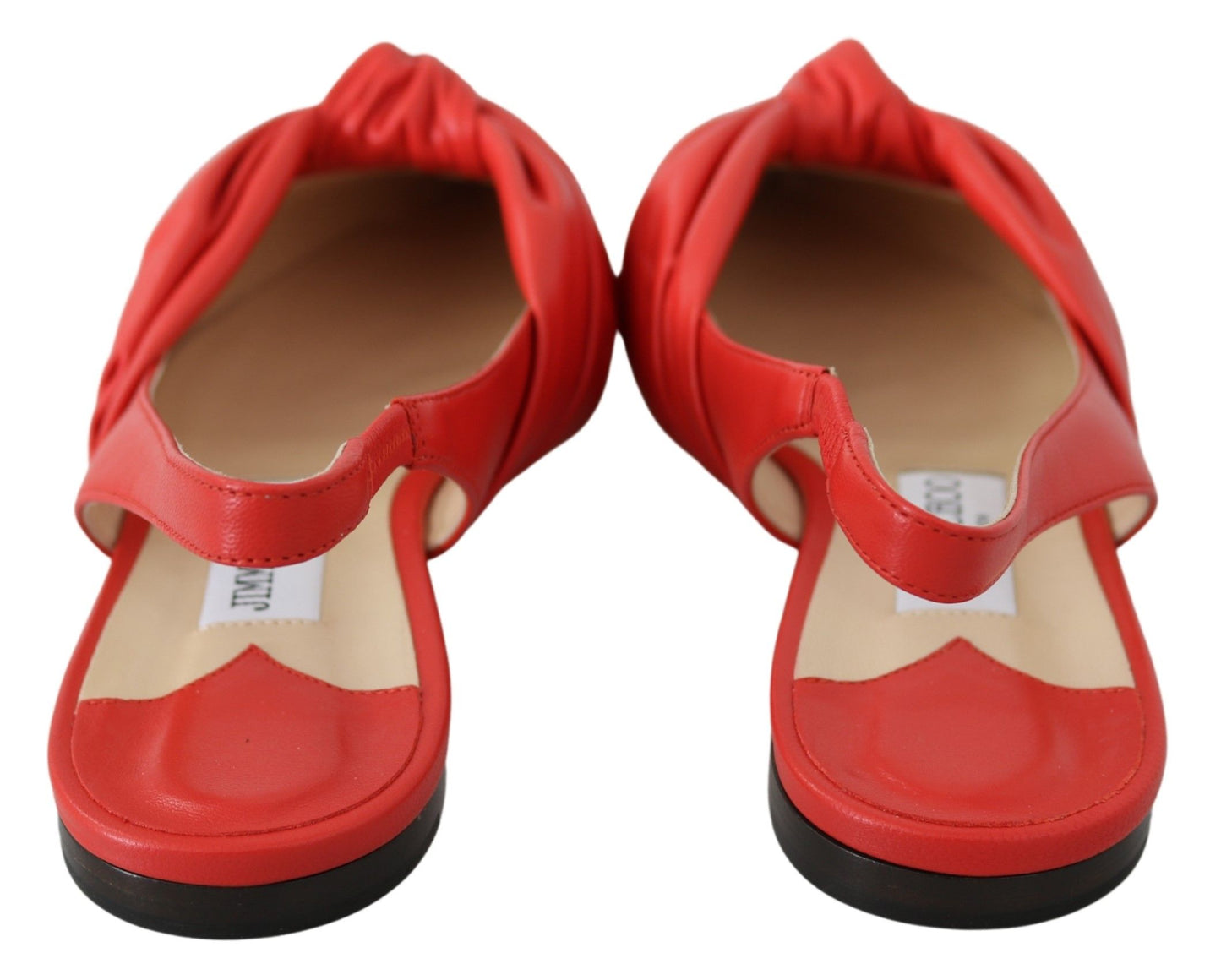 Elegantes zapatos planos de cuero con punta roja