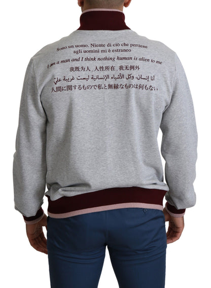 Elegante jersey gris de cuello alto con motivo latino