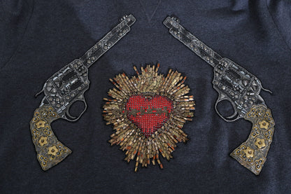 Suéter gris con motivo de pistola y corazón de cristal