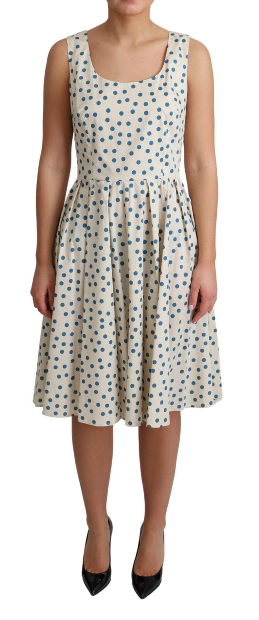 Elegante vestido beige de lunares sin mangas en forma de A