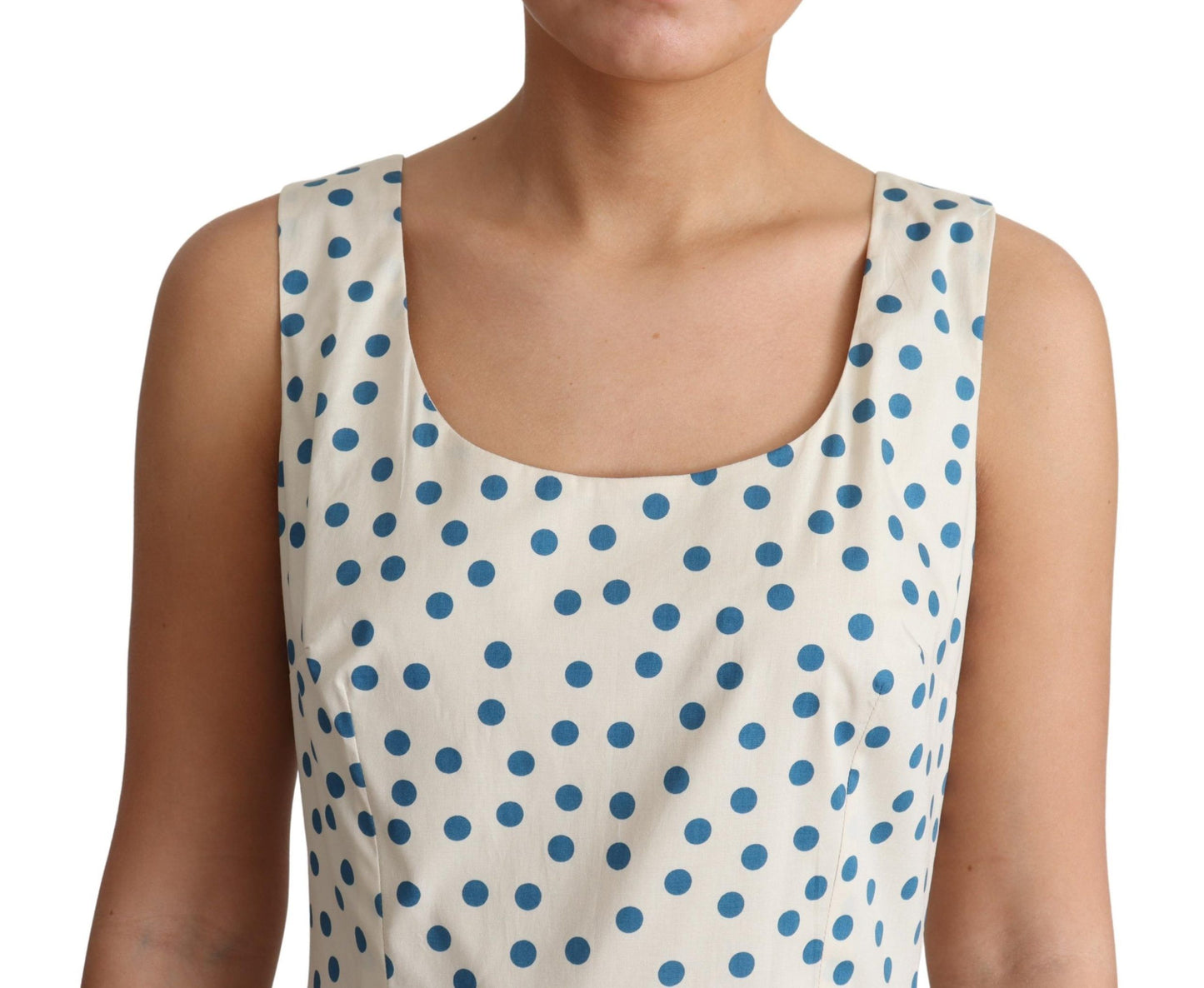 Elegante vestido beige de lunares sin mangas en forma de A