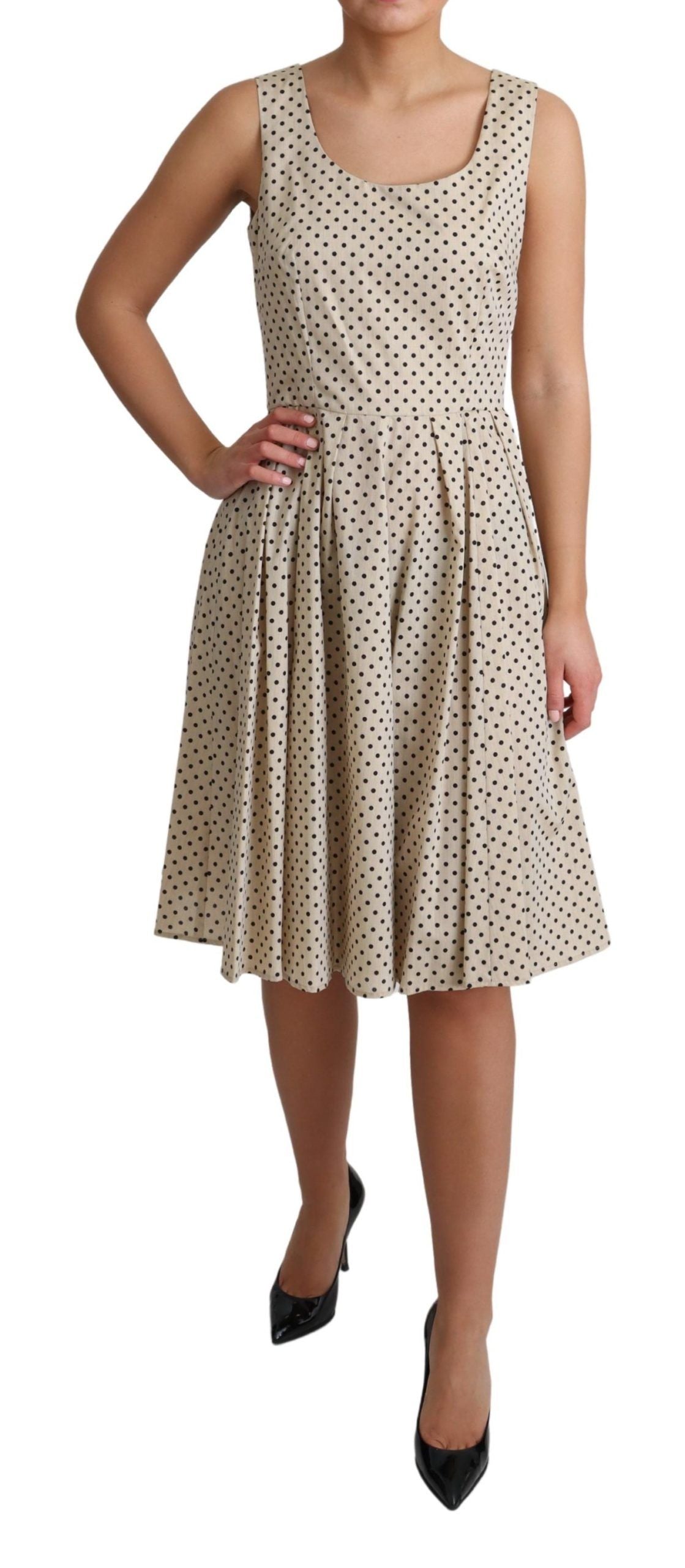 Elegante vestido de lunares sin mangas de corte A