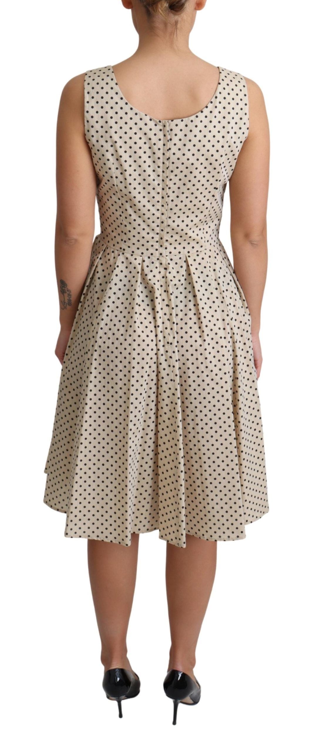 Elegante vestido de lunares sin mangas de corte A