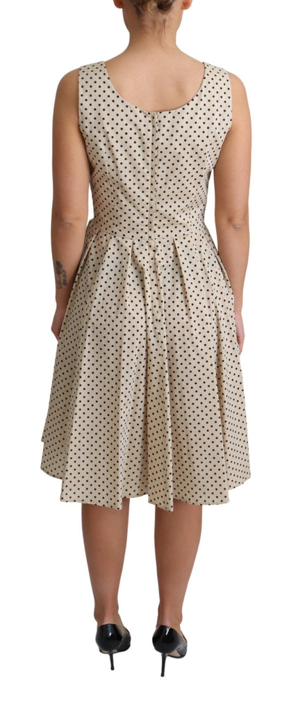 Elegante vestido de lunares sin mangas de corte A