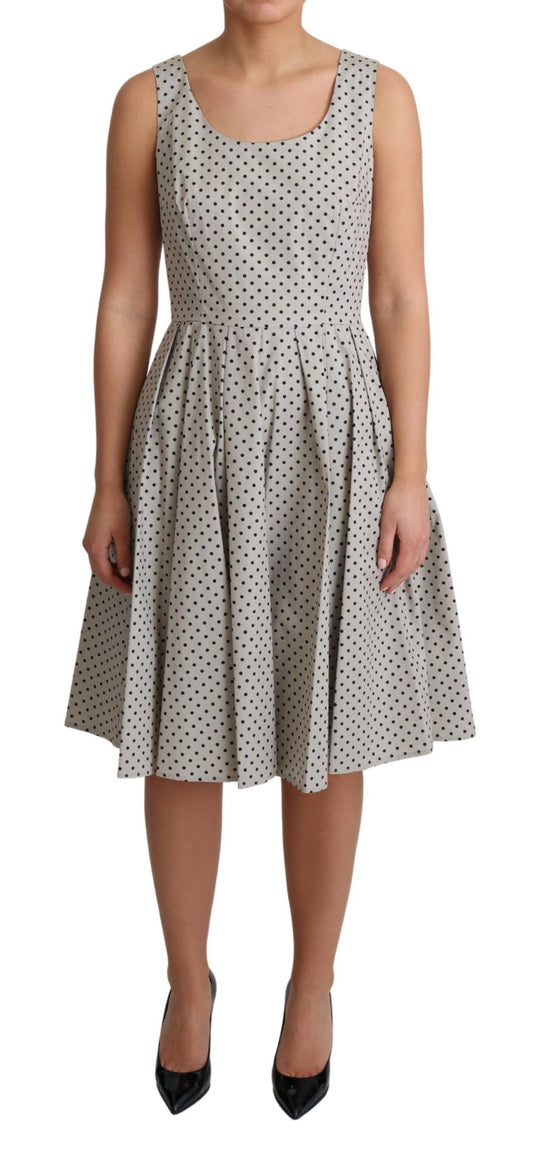 Vestido beige sin mangas de corte A con lunares