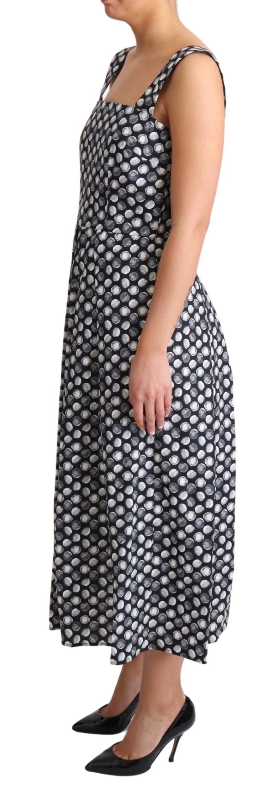 Elegante vestido midi geométrico sin mangas de corte A