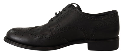 Elegantes zapatos Derby de cuero negro con punta de ala