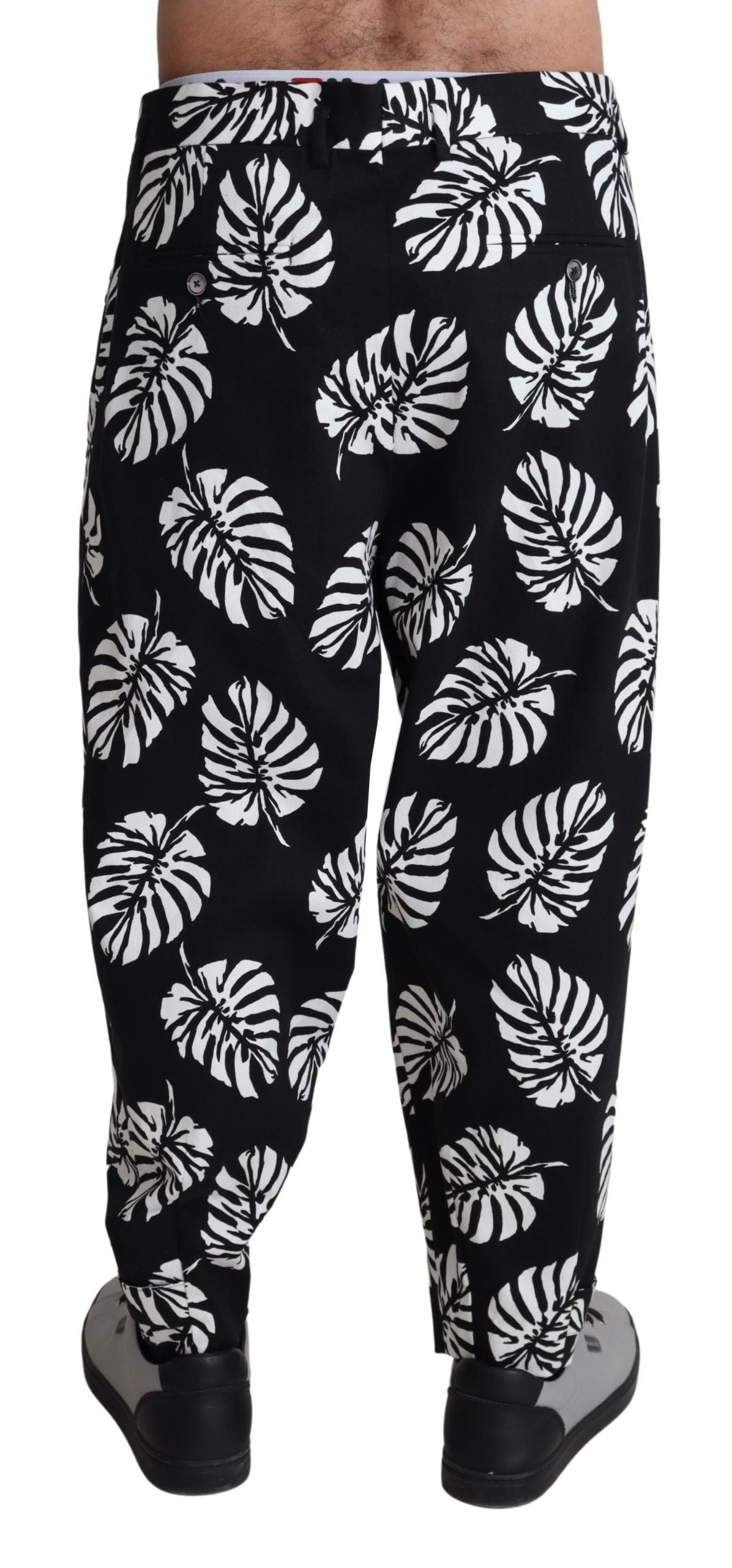 Elegante pantalón de algodón con estampado de hojas de palma