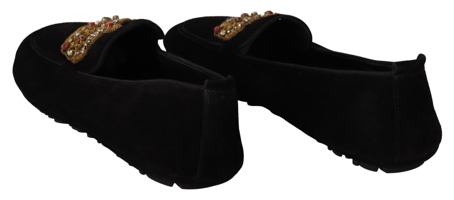 Elegantes mocasines de piel negra con bordado dorado