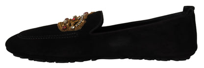 Elegantes mocasines de piel negra con bordado dorado