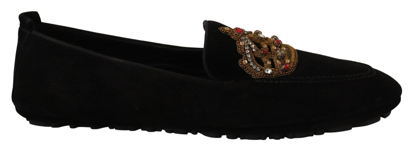 Elegantes mocasines de piel negra con bordado dorado