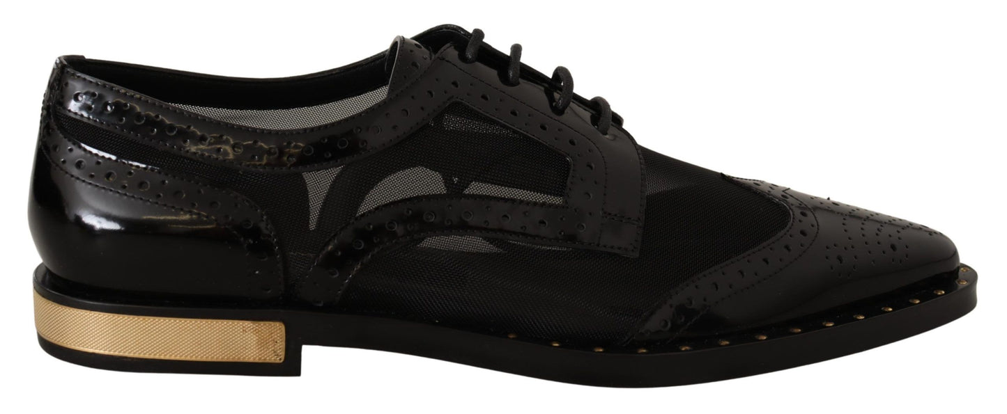 Elegantes zapatos Oxford negros con cordones y ribete dorado