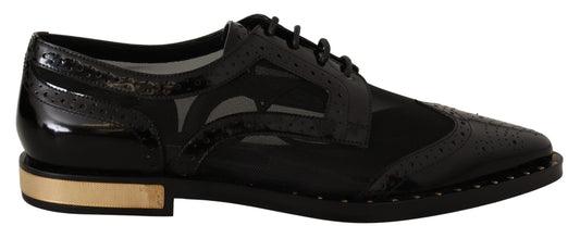 Elegantes zapatos Oxford negros con cordones y ribete dorado
