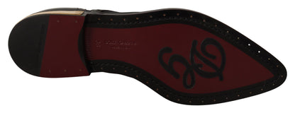 Elegantes zapatos Oxford negros con cordones y ribete dorado