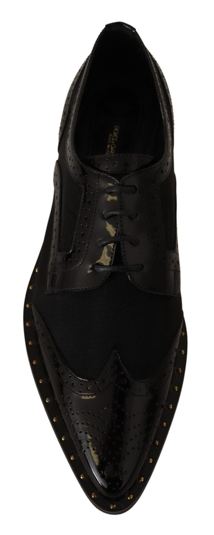 Elegantes zapatos Oxford negros con cordones y ribete dorado