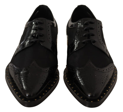 Elegantes zapatos Oxford negros con cordones y ribete dorado