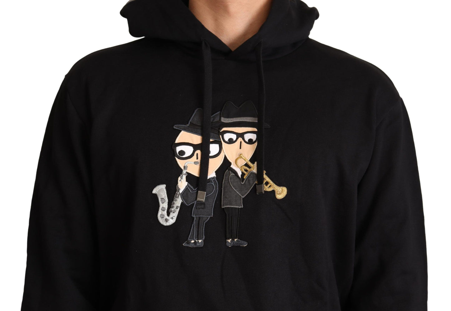Elegante suéter de algodón negro bordado
